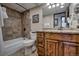Well-maintained bathroom features a shower, toilet, and granite vanity with ample cabinet space at 611 Village Rd # 620, Breckenridge, CO 80424