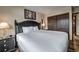 Spacious bedroom with a king bed, closet, and stylish decor providing a relaxing retreat at 611 Village Rd # 620, Breckenridge, CO 80424