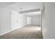 This open basement space is carpeted and painted in a neutral color at 1740 S Ammons St # C, Lakewood, CO 80232