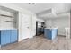 Stylish kitchen with stainless steel appliances, a central island, and plenty of counter space at 1740 S Ammons St # C, Lakewood, CO 80232