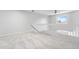 This bright loft features neutral decor, soft carpeting, and a ceiling fan at 1740 S Ammons St # C, Lakewood, CO 80232