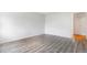 Spacious bedroom with modern wood-look floors and plenty of natural light from an unseen window at 5711 W 92Nd Ave # 47, Westminster, CO 80031