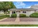 Inviting home with a well-manicured lawn and attractive landscaping leading to the front door at 5711 W 92Nd Ave # 47, Westminster, CO 80031