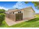 Back exterior view of townhouse, showing fenced yard and street at 5711 W 92Nd Ave # 47, Westminster, CO 80031