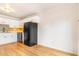 Eat-in kitchen featuring white cabinets, modern appliances, and lots of counter space at 5711 W 92Nd Ave # 47, Westminster, CO 80031