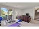 Finished basement featuring walk-out access to a patio and outdoor space at 7605 E Windlawn Way, Parker, CO 80134