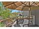 Inviting wooden deck with lounge seating and scenic outdoor view at 7605 E Windlawn Way, Parker, CO 80134