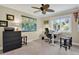 Comfortable office with world map, ceiling fan, a large window providing natural light at 7605 E Windlawn Way, Parker, CO 80134