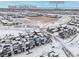 Aerial view of the neighborhood showcasing community pool, downtown skyline, and parks at 10088 E 62Nd Ave, Denver, CO 80238