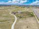 Aerial view of bike park with curved track and sidewalks in a beautiful community at 10088 E 62Nd Ave, Denver, CO 80238