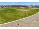 A lush, green open field with walking path at 10088 E 62Nd Ave, Denver, CO 80238