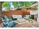 Relaxing backyard patio with fire pit, seating, and umbrella at 595 S Race St, Denver, CO 80209