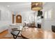 Casual dining area with a round table and chairs, adjacent to the living room at 595 S Race St, Denver, CO 80209