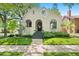 Attractive stucco home, featuring a classic design and lush green lawn at 595 S Race St, Denver, CO 80209