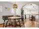 Modern kitchen featuring white cabinets, butcher block counters, and island at 595 S Race St, Denver, CO 80209