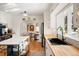 Bright kitchen with an island, white cabinets, and a vintage stove at 595 S Race St, Denver, CO 80209