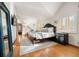 Spacious Primary bedroom with hardwood floors and large windows at 595 S Race St, Denver, CO 80209