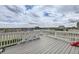 Deck overlooking backyard with scenic views at 16122 Emporia Way, Brighton, CO 80602