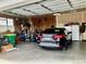 Garage with storage and space for a vehicle at 16122 Emporia Way, Brighton, CO 80602