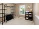 Functional closet space with a window view, shelving, and a laundry organization system at 2214 E 101St Ave, Thornton, CO 80229