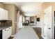 Open kitchen with a large island overlooking the living room at 2214 E 101St Ave, Thornton, CO 80229