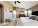 Serene main bedroom with neutral walls, vaulted ceiling, and ample space for relaxation at 2214 E 101St Ave, Thornton, CO 80229