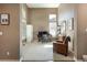 Well-lit home office featuring a desk, chair, and ample storage at 2214 E 101St Ave, Thornton, CO 80229