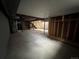 Large basement featuring a concrete floor and exposed pipes at 11306 E Colorado Dr, Aurora, CO 80012