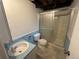 Small bathroom with a vanity, toilet, and walk-in shower with sliding doors at 11306 E Colorado Dr, Aurora, CO 80012