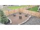 Backyard featuring an outdoor seating area, perfect for relaxing and entertaining at 2404 Horse Shoe Cir, Fort Lupton, CO 80621