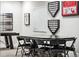Finished basement featuring a game table, baseball memorabilia display, and neutral color scheme at 2404 Horse Shoe Cir, Fort Lupton, CO 80621