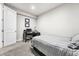 Clean bedroom with neutral colors and carpet and study area at 2404 Horse Shoe Cir, Fort Lupton, CO 80621
