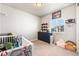 Bright, tidy Bedroom with dresser, baseball decor, and window offering natural light at 2404 Horse Shoe Cir, Fort Lupton, CO 80621