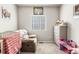 A cozy room with soft carpet and plenty of room for play and imagination at 2404 Horse Shoe Cir, Fort Lupton, CO 80621