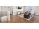 Cozy living room with a comfortable sofa, large windows and stylish decor at 2404 Horse Shoe Cir, Fort Lupton, CO 80621