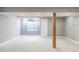 Spacious finished basement area with new carpet, pot lights, and neutral-colored walls at 674 Huntington Dr, Highlands Ranch, CO 80126