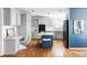 Bright kitchen with a large island, stainless steel appliances, and hardwood flooring at 674 Huntington Dr, Highlands Ranch, CO 80126