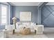 Stylish living room with modern decor, plush seating, and decorative wall accents at 674 Huntington Dr, Highlands Ranch, CO 80126