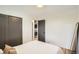 Bedroom with natural light and a view of the laundry room at 1087 Wolff St, Denver, CO 80204
