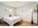Bright bedroom with natural light and wood floors at 1087 Wolff St, Denver, CO 80204