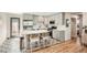 Well-equipped kitchen with gray cabinets, stainless appliances, and decorative flooring at 1087 Wolff St, Denver, CO 80204