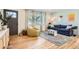 Bright living room with hardwood floors, stylish furniture, and a welcoming atmosphere at 1087 Wolff St, Denver, CO 80204