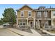 Charming two-story townhome with a cozy front porch and well-maintained landscaping at 15612 E 96Th Way # 29A, Commerce City, CO 80022