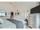 Cozy main bedroom showcasing an ensuite bathroom and walk-in closet at 15612 E 96Th Way # 29A, Commerce City, CO 80022