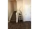 Staircase with wood floors, leading to the upper level of the home at 15612 E 96Th Way # 29A, Commerce City, CO 80022