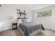 Comfortable bedroom featuring a neutral color palette and a large window for natural light at 3545 Moorhead Ave, Boulder, CO 80305