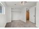 Spacious bedroom featuring a large closet and a window with natural light, ready for personalization at 3545 Moorhead Ave, Boulder, CO 80305