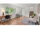 Bright entryway featuring hardwood floors, modern decor, and staircase to the upper level at 3545 Moorhead Ave, Boulder, CO 80305
