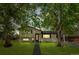 Charming two-story home with beautifully landscaped front yard and mature trees at 3545 Moorhead Ave, Boulder, CO 80305