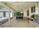 Inviting covered patio enhanced with ambient string lights, stylish outdoor seating, and serene backyard views at 3545 Moorhead Ave, Boulder, CO 80305